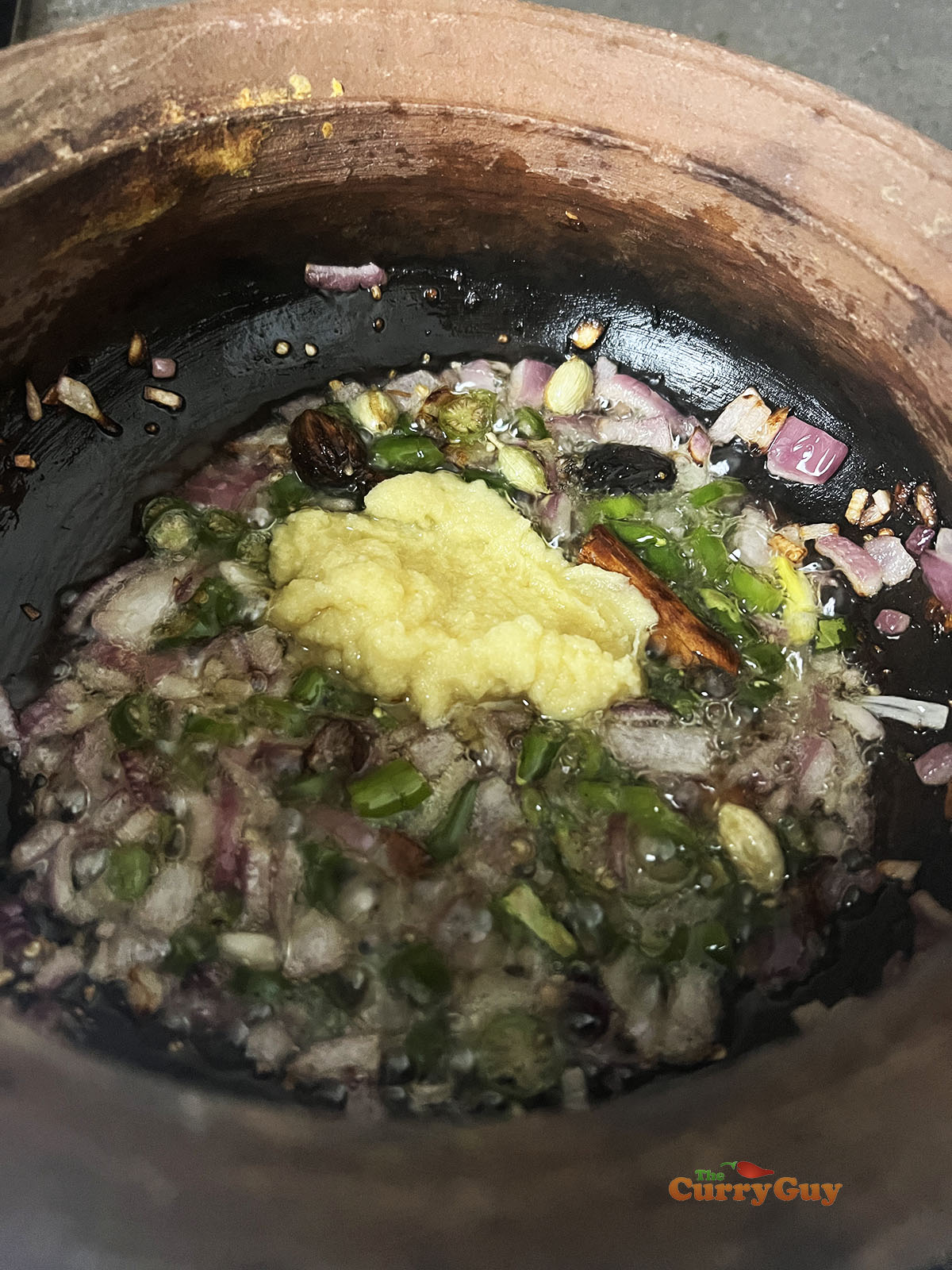 Adding the garlic and ginger paste.