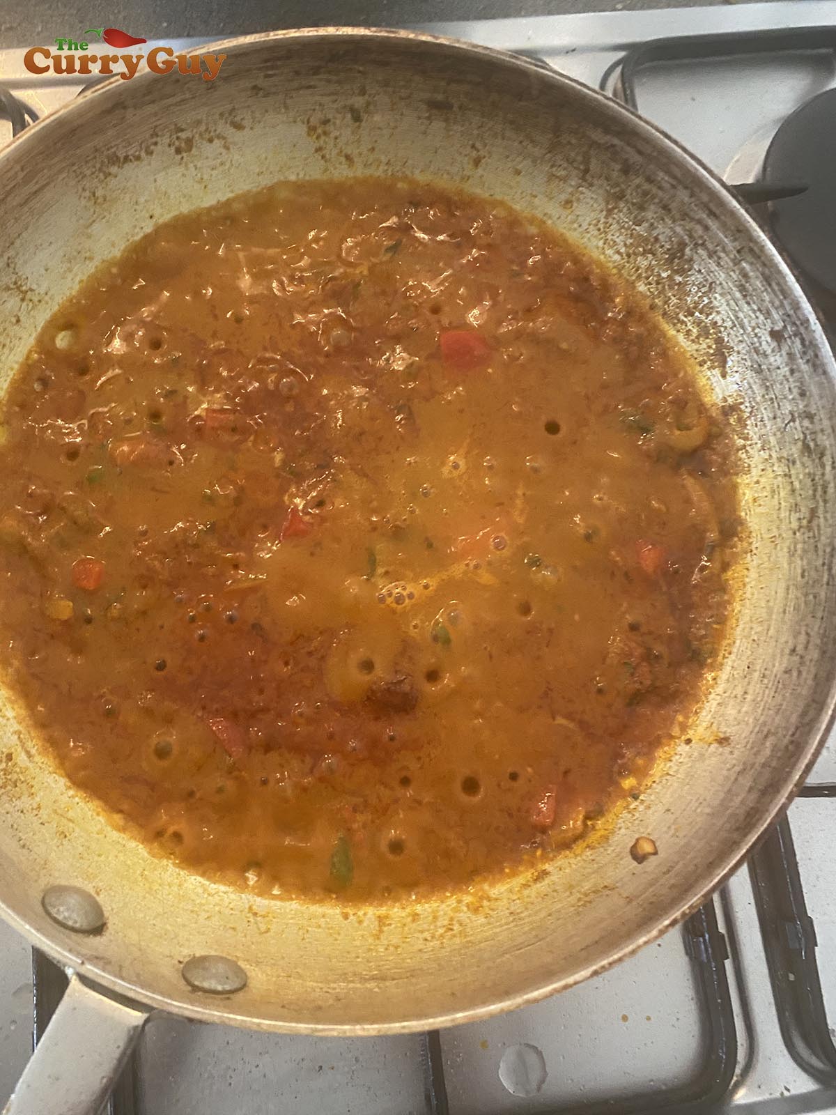 Adding base sauce to pan