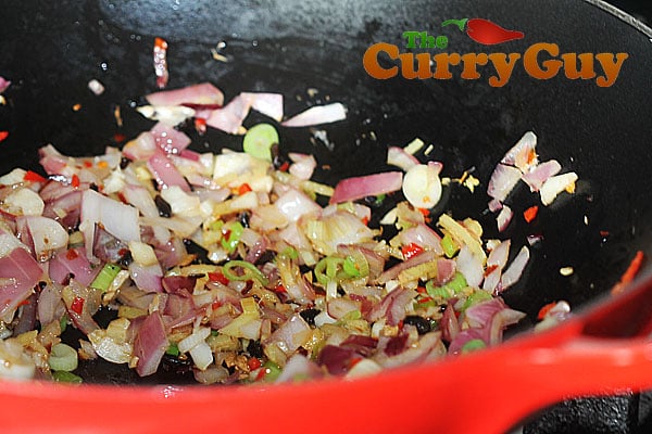 Frying onions for Thai Pork Curry