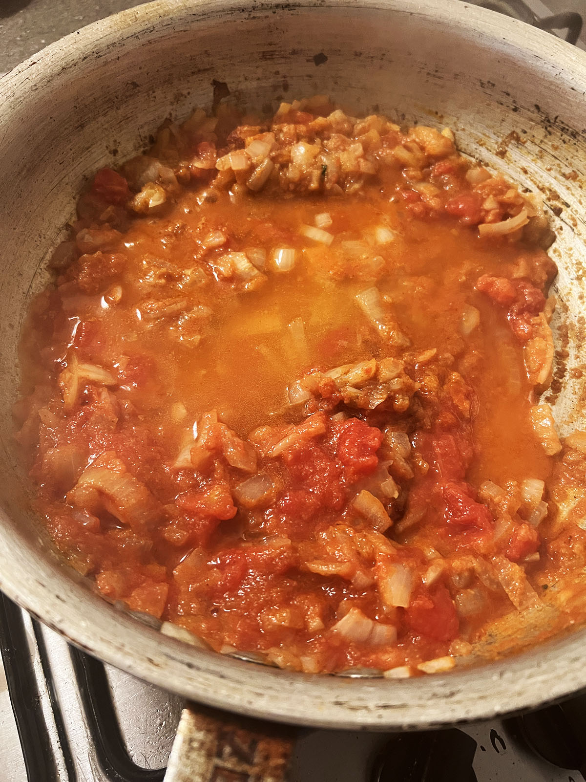 Adding water or chicken stock to pan