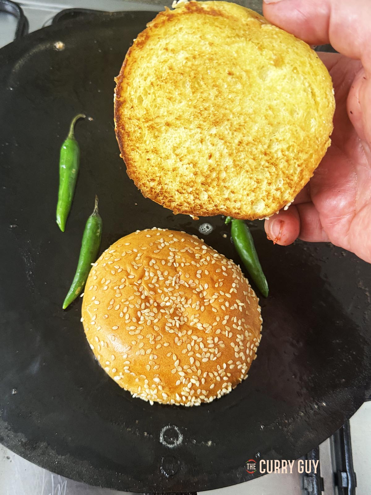 Toasting the buns for the burger.