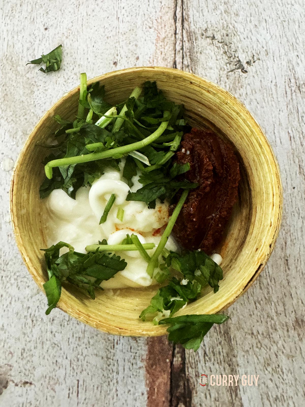 Making the burger sauce.