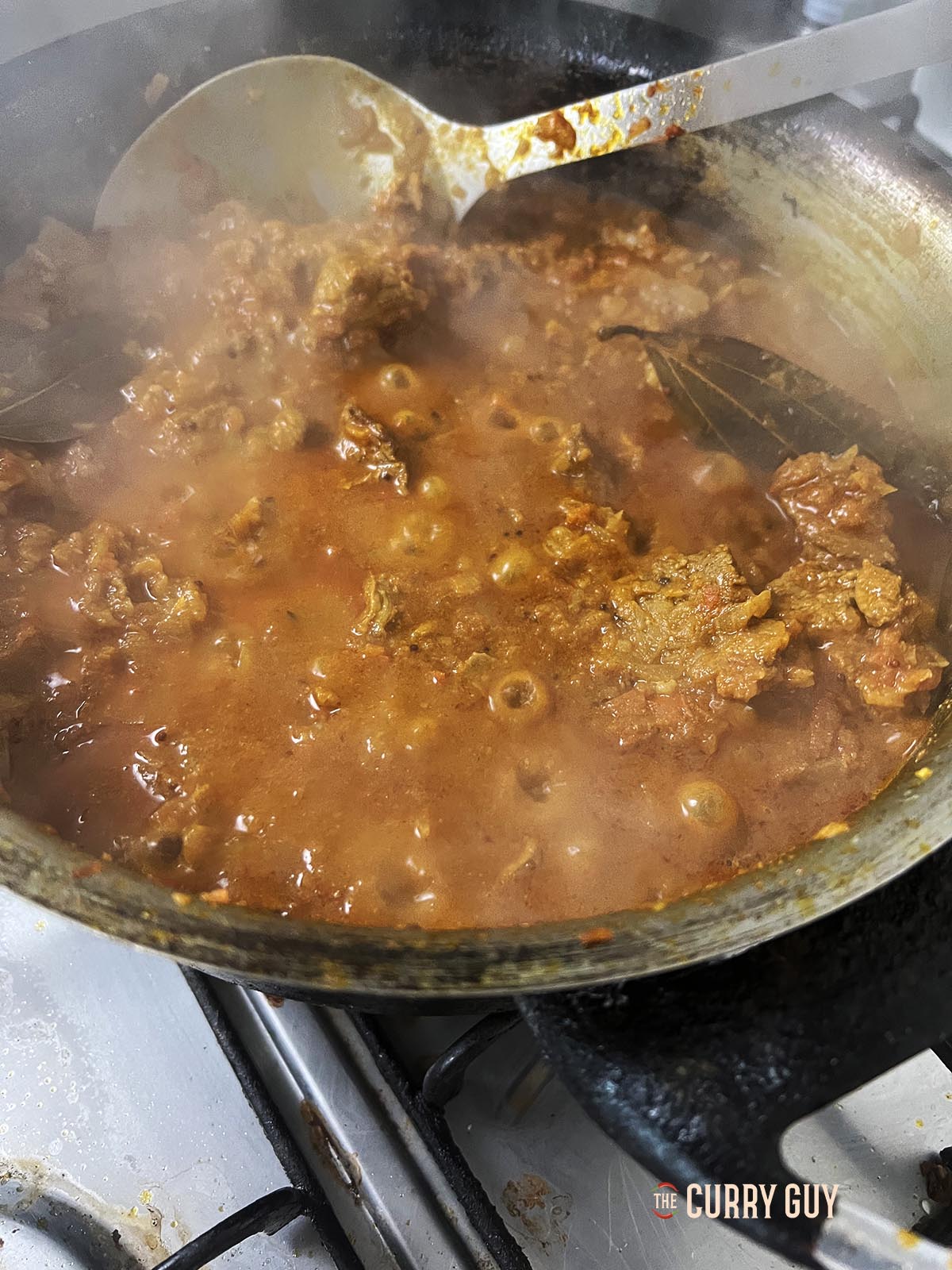 The sauce simmering.