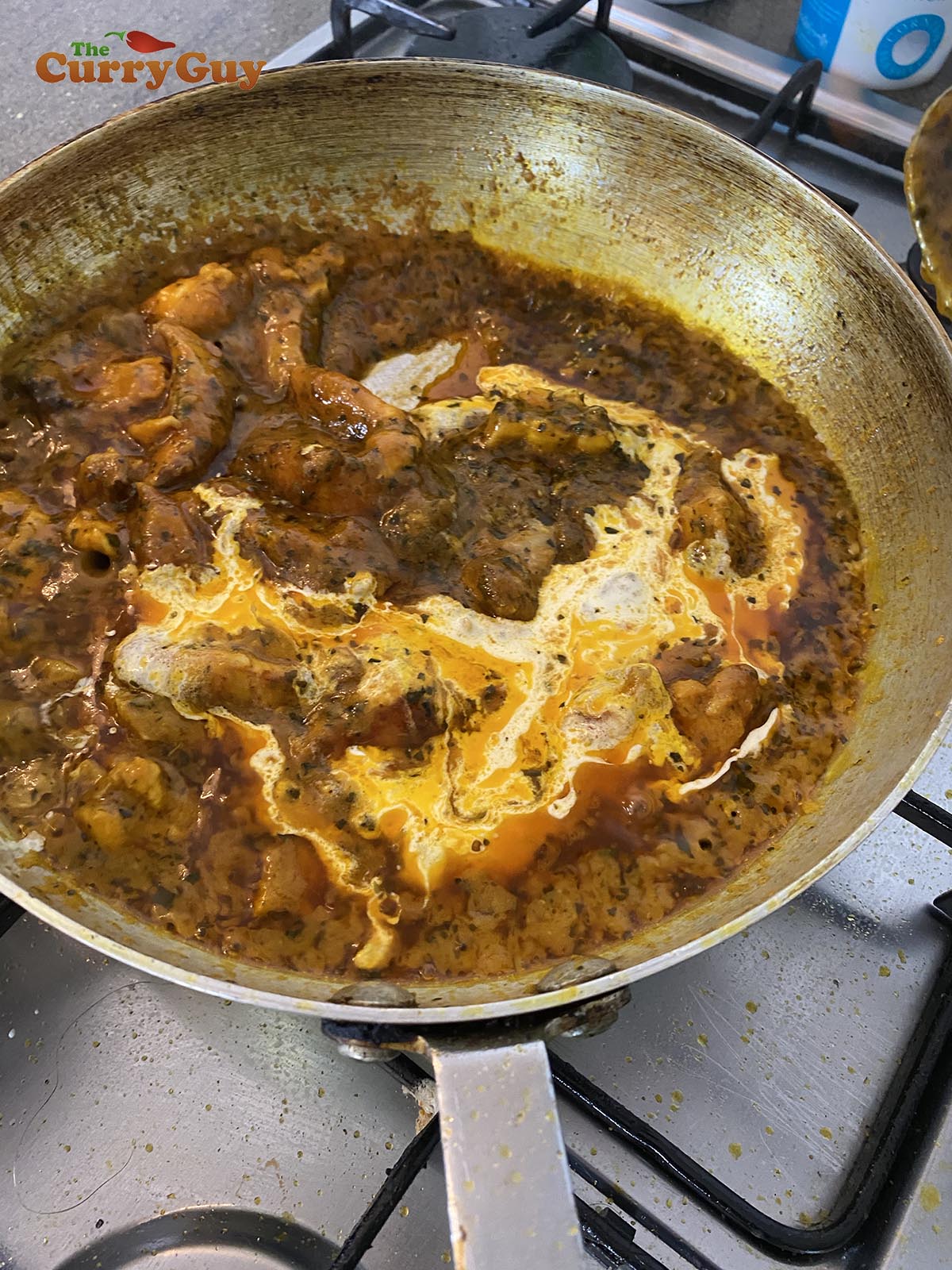 Adding cream to the pan