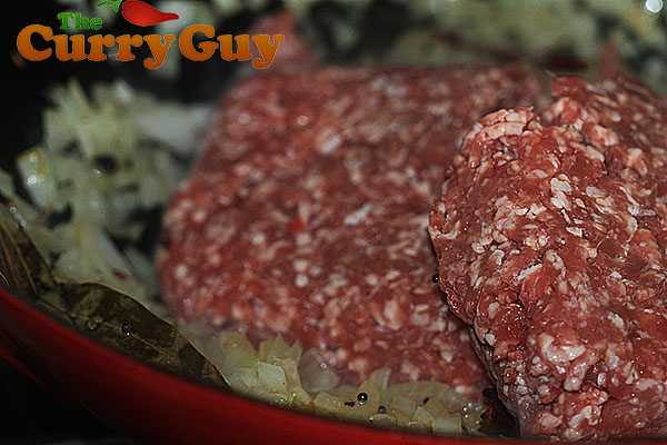 Adding lamb to lamb keema saag
