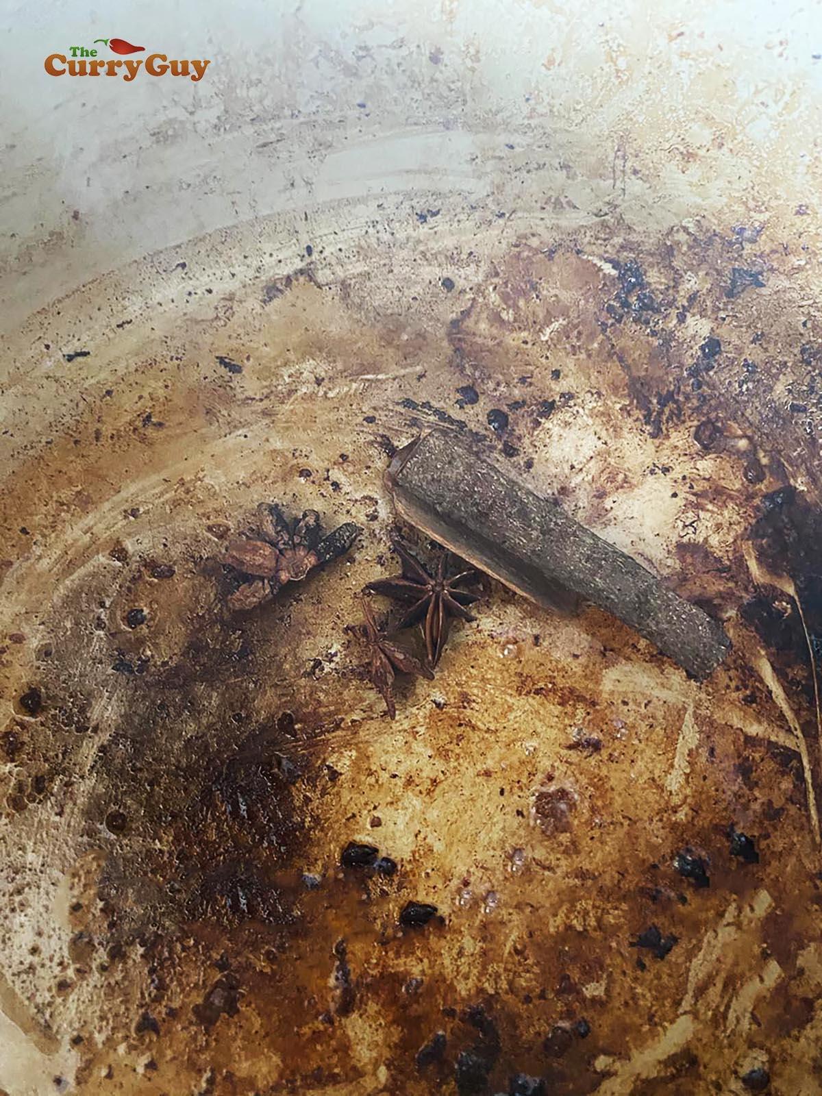 Infusing whole spices in the oil.