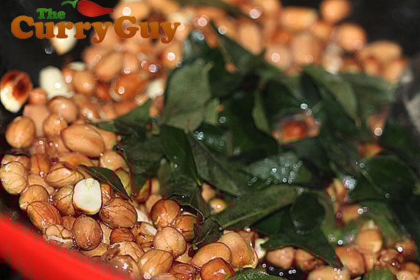 Stir in the fresh curry leaves.