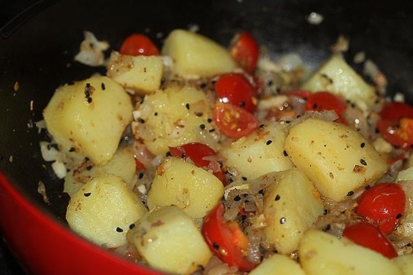 Making saag aloo
