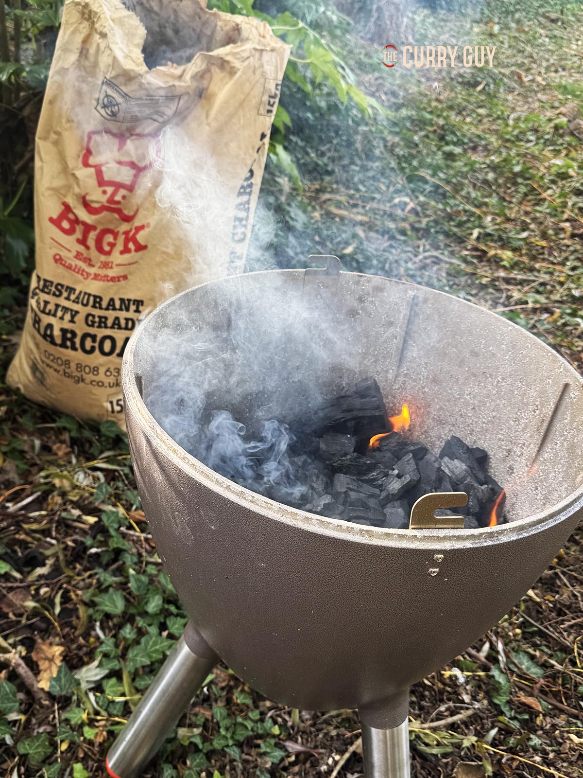 Lighting a Doori tandoor oven.