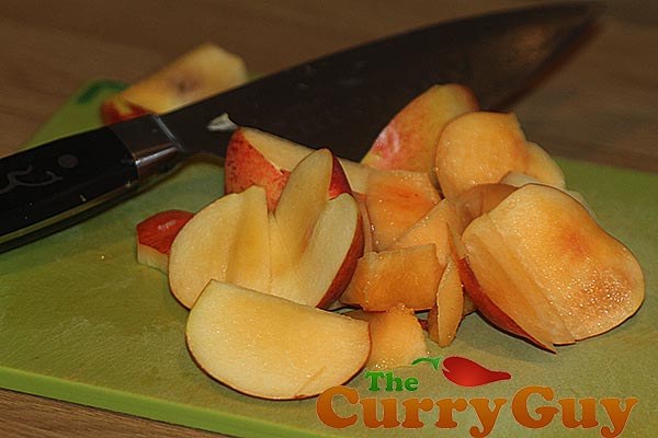 Making nectarine and turmeric lassi