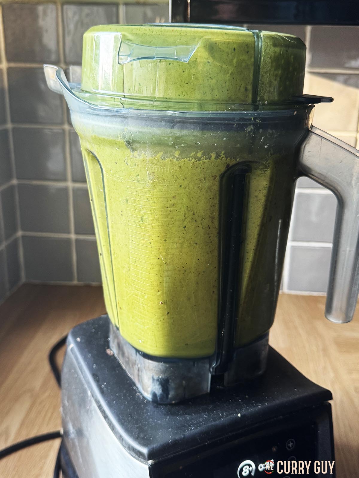 Blending the coriander and cashew sauce.