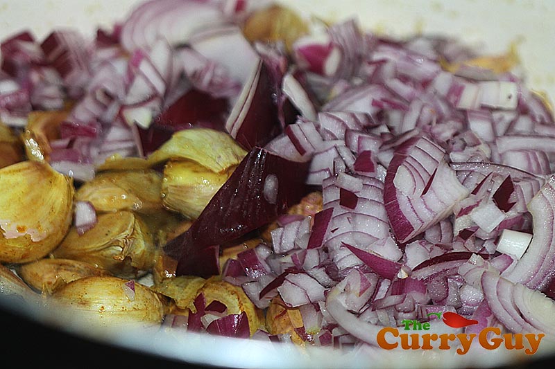 Making garlic and chickpea soup