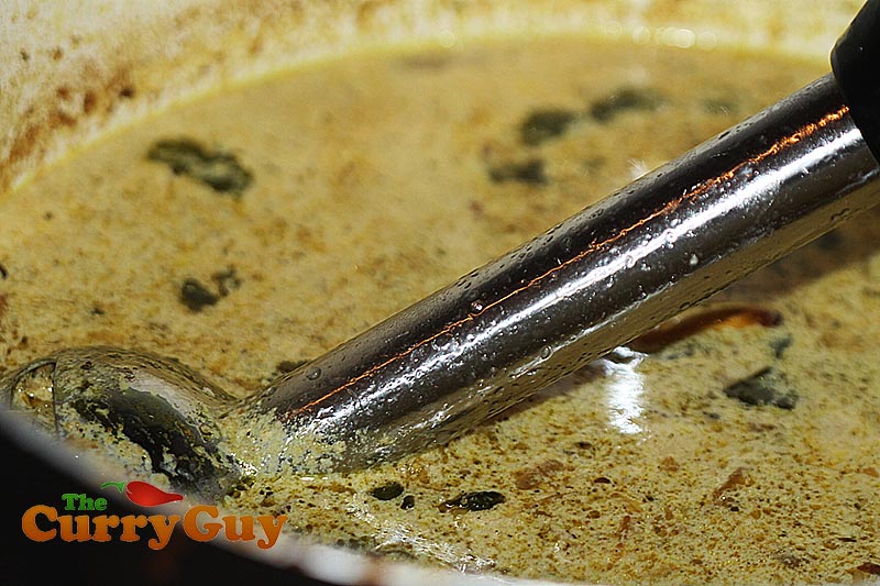 Making garlic and chickpea soup