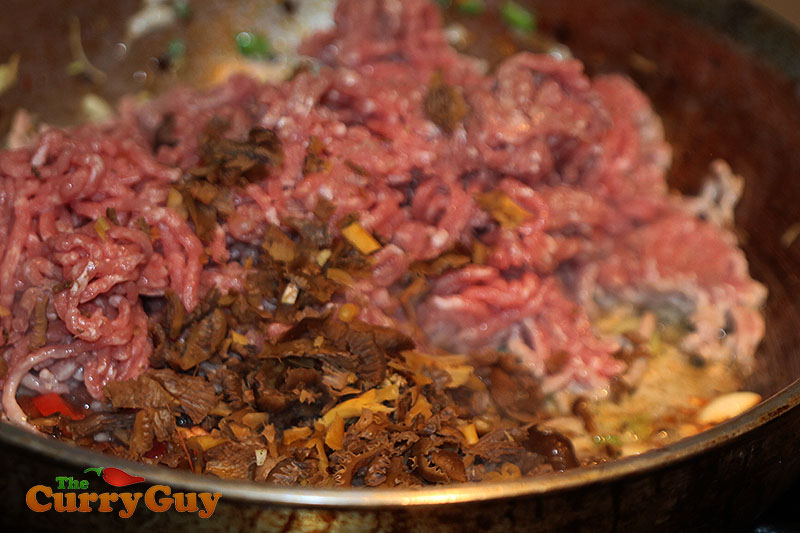 Making pork and mushroom lettuce wraps