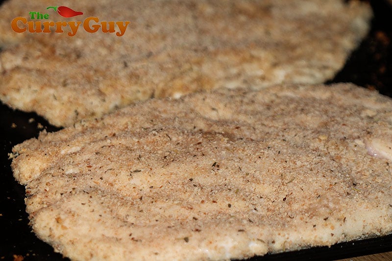 Making chicken parmos