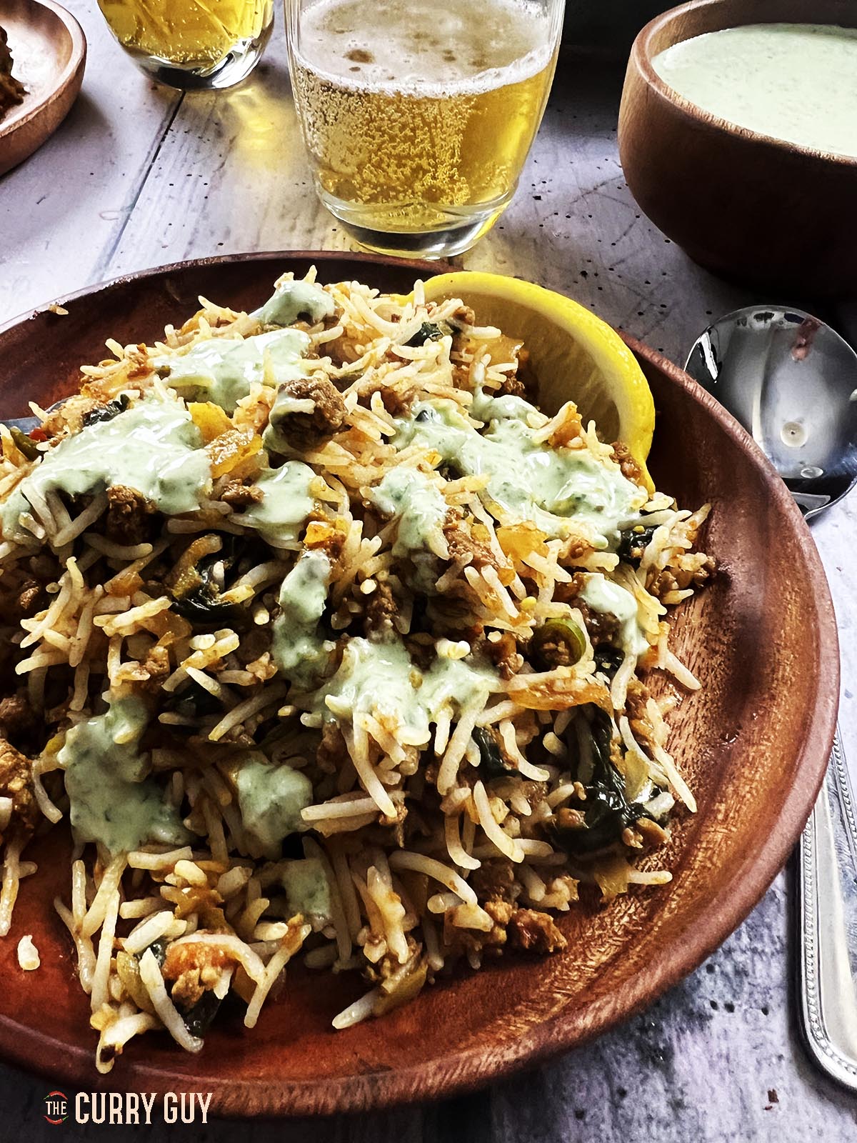 Keema biryani served on a plate.