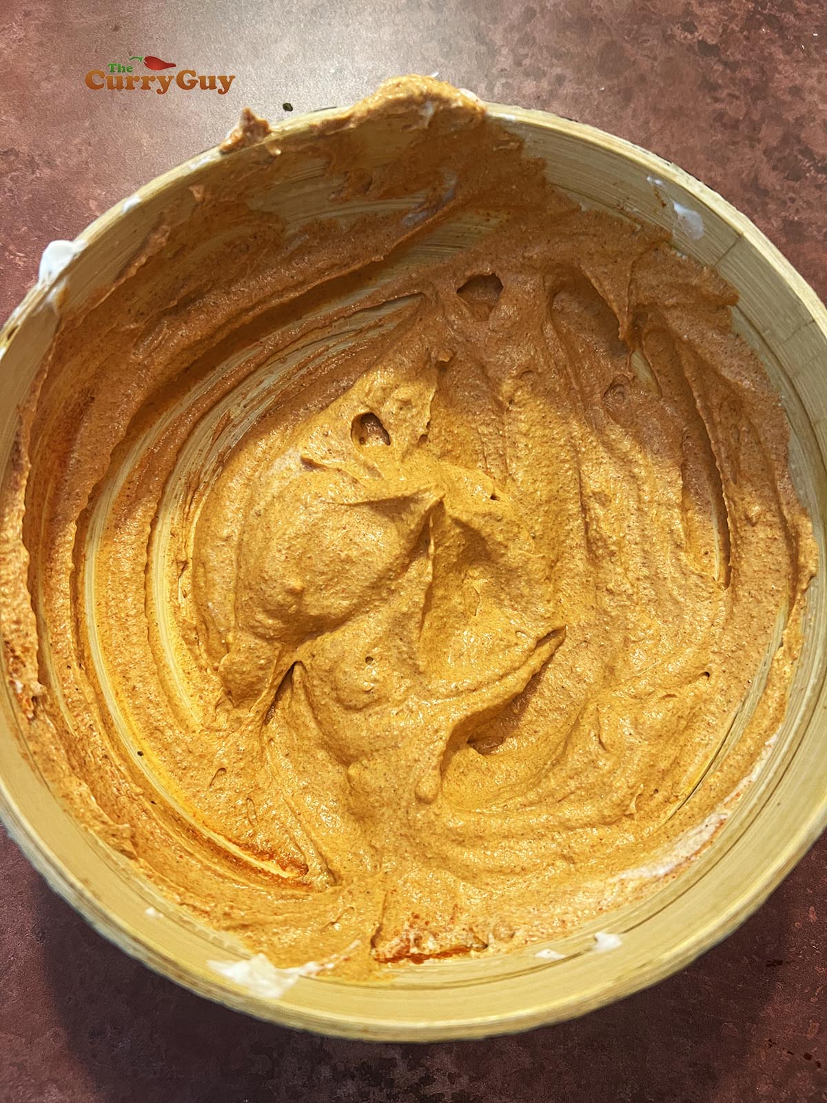 Spices whisked into the cream cheese and yoghurt mixture.