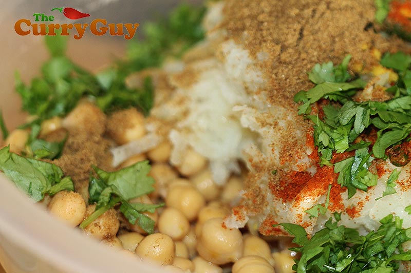 Making chickpea and potato tikki