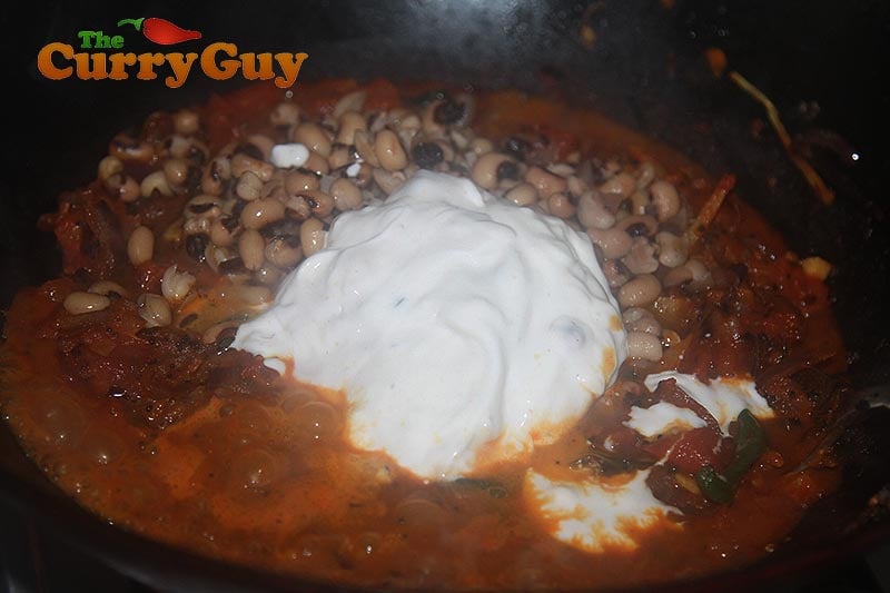 finishing off the black eyed pea curry.