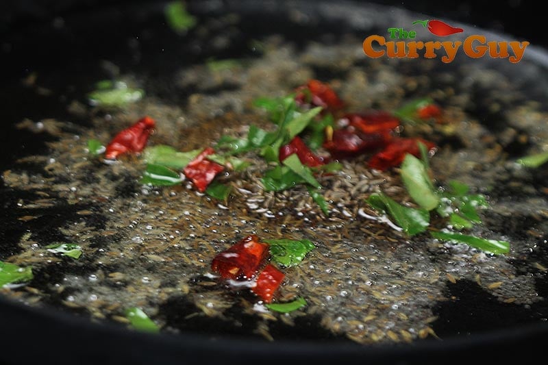 Making spicy mixed vegetable pickle