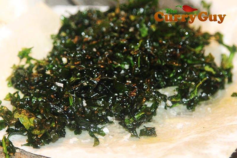 Making spinach chaat.