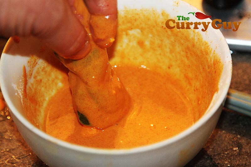 Making spinach chaat.