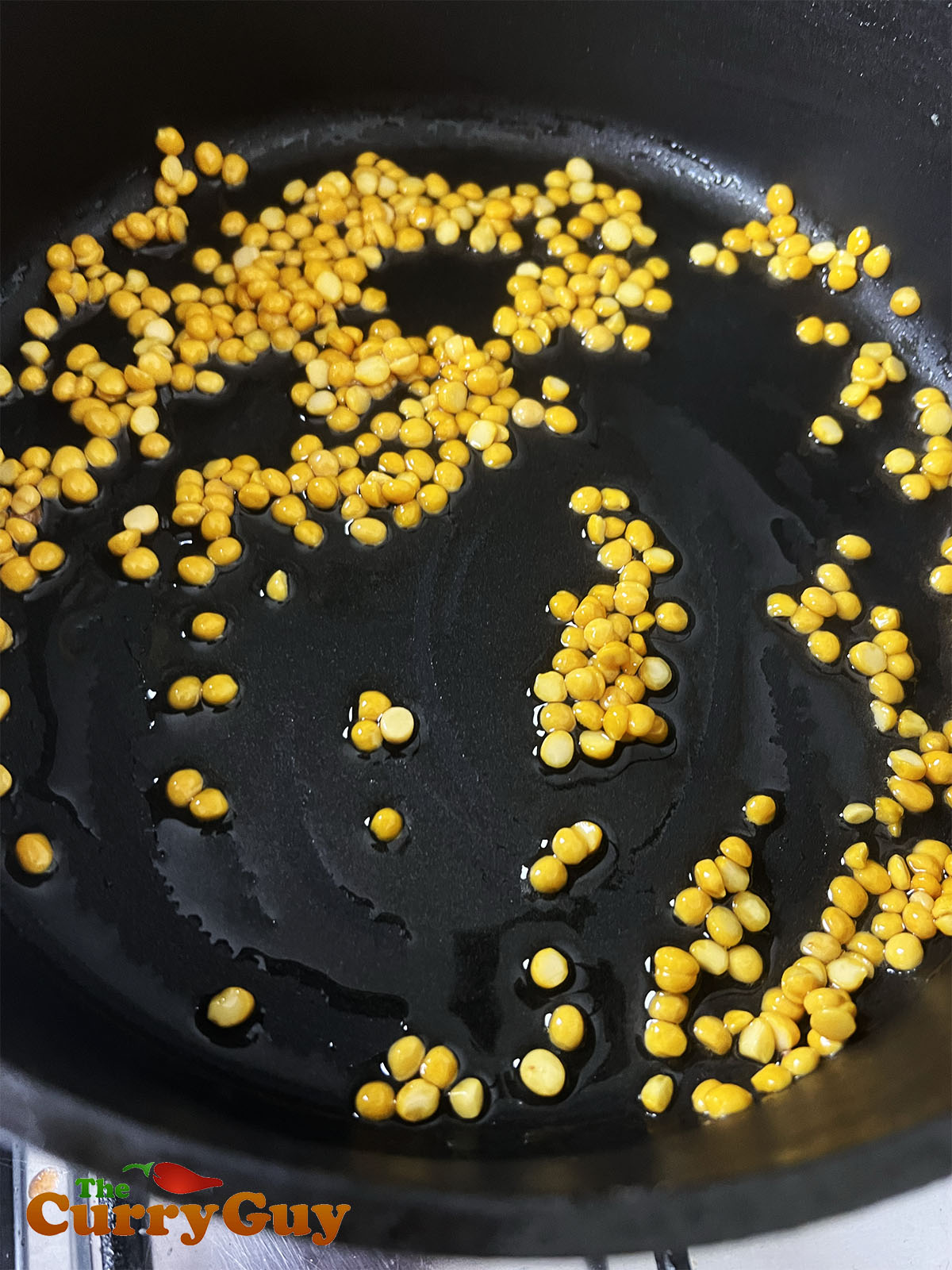 Toasting the lentils.