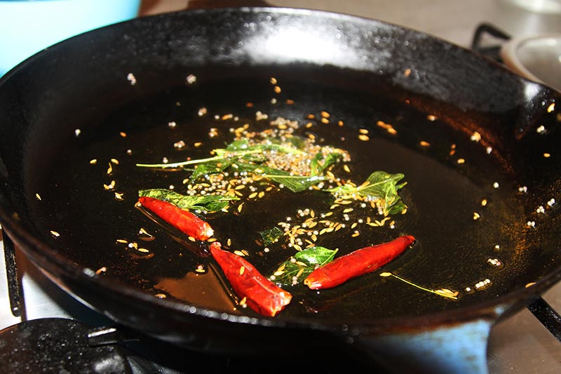 Making sprouted moong salad