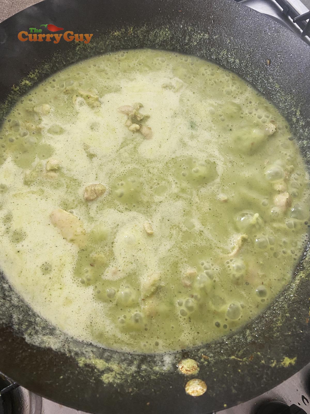 Simmering Thai green curry