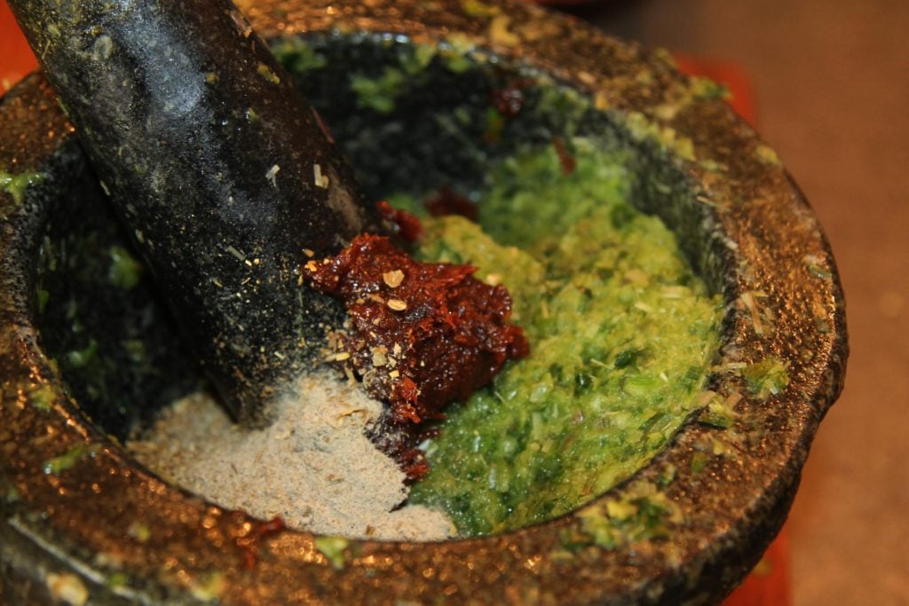 Making Thai green curry paste