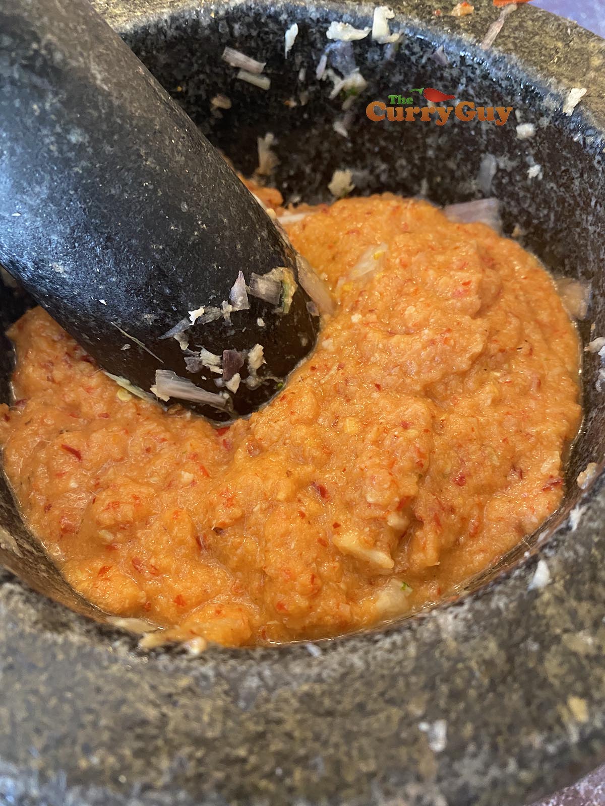 Pounding curry paste
