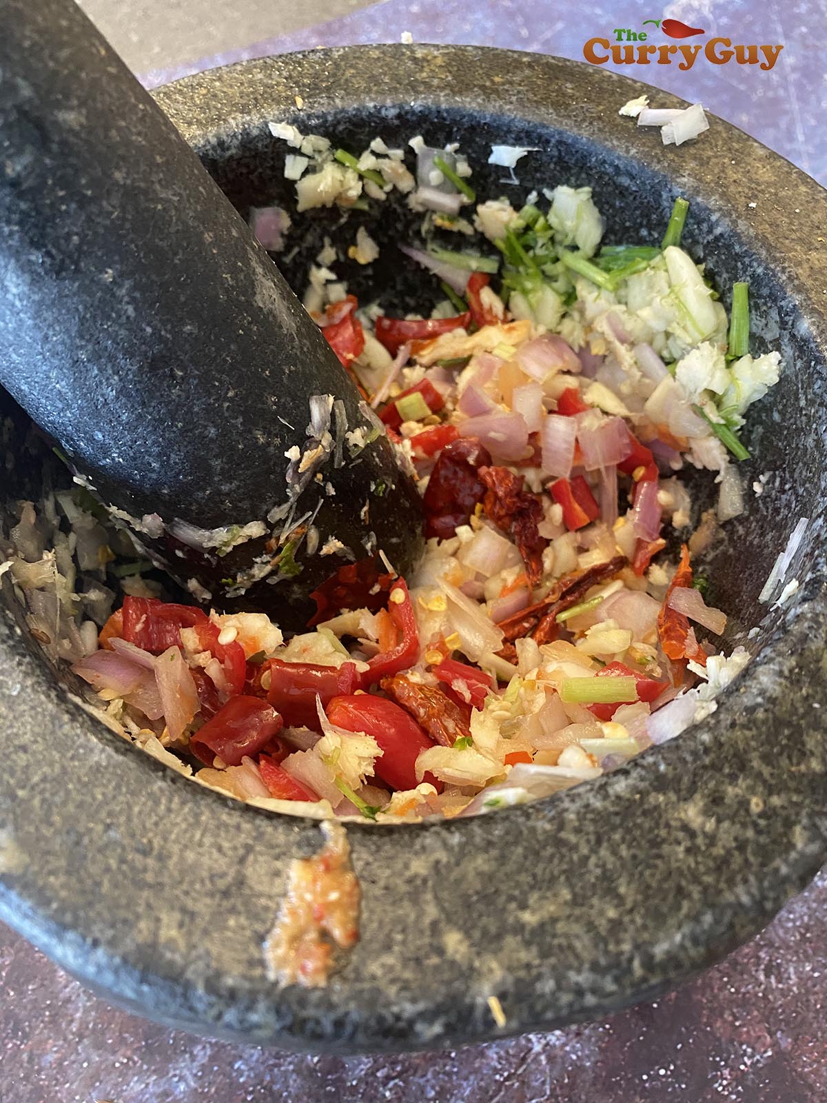 Pounding curry paste ingredients
