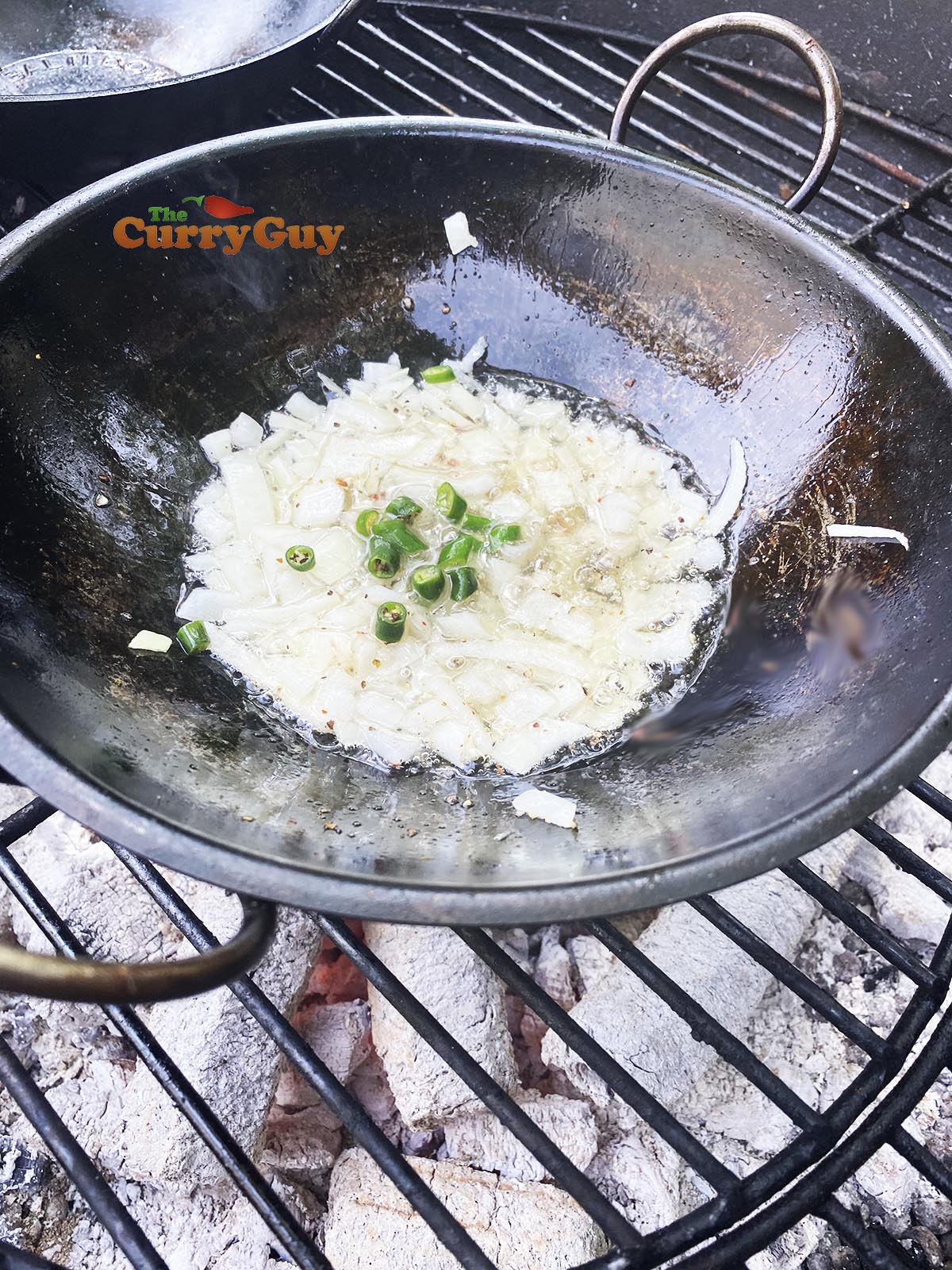 Frying onions and chillies