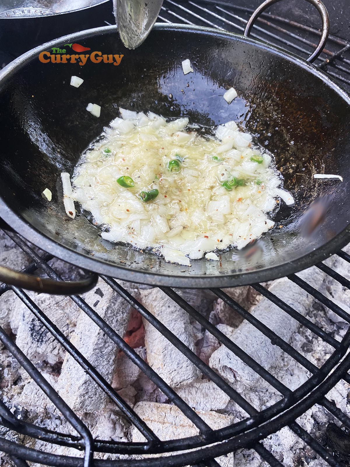 Adding garlic and ginger paste