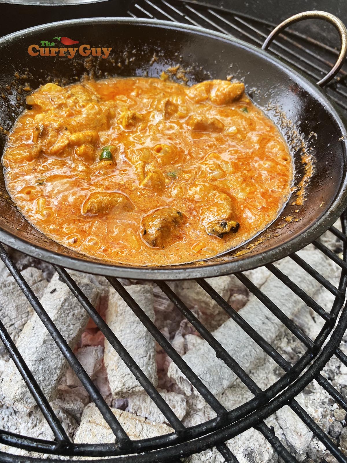 Adding chicken to pan