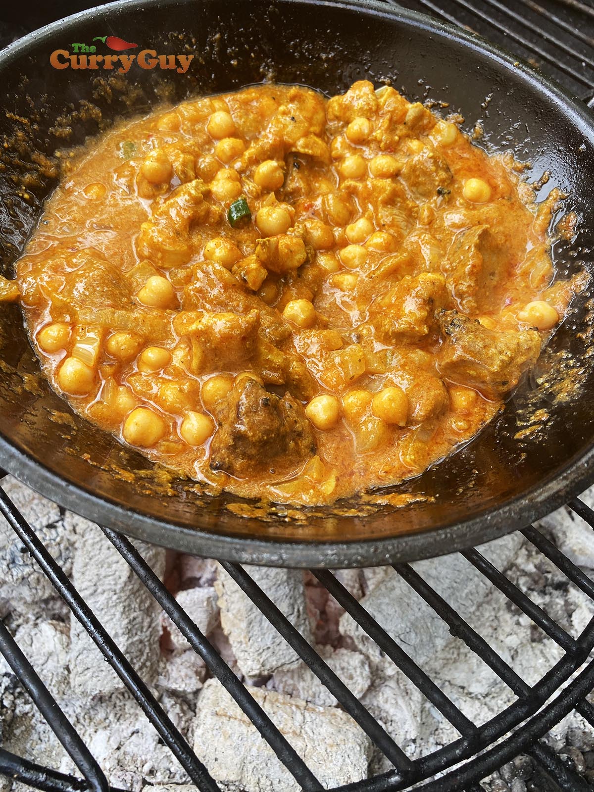 Adding chickpeas to the pan