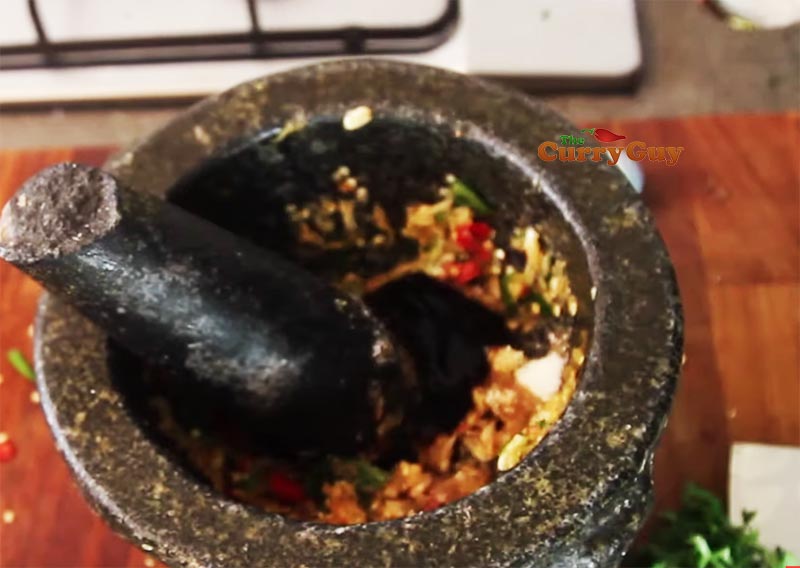 Making Thai seafood sauce for Thai Salt crust fish