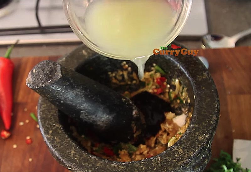 Making Thai seafood sauce for Thai Salt crust fish