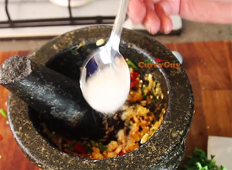 Making Thai seafood sauce for Thai Salt Crust fish