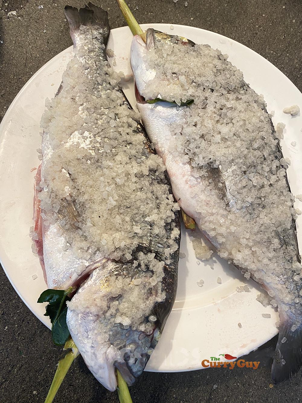 Fish covered in a salt, flour and water paste.