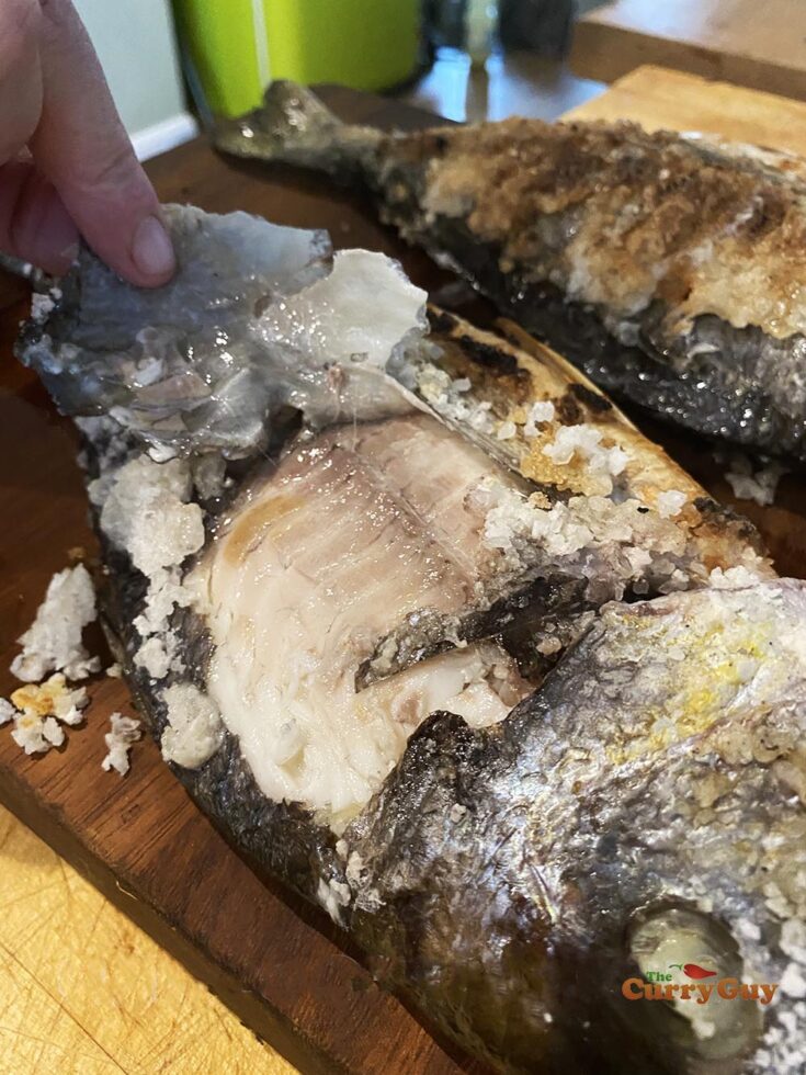 Peeling off the skin.