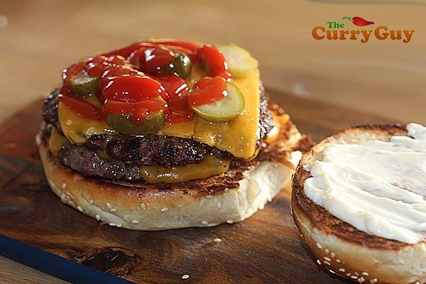 Adding ketchup to a burger