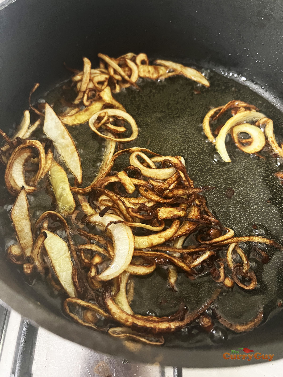 Frying the onions.