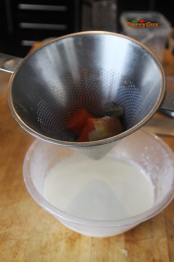 straining infused milk