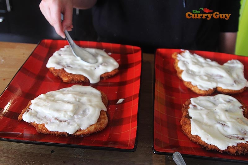 topping parmos with sauce