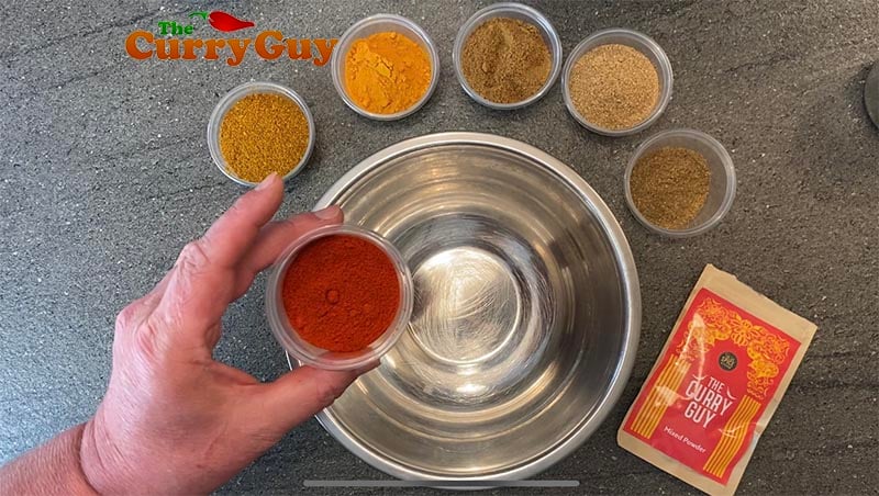 adding paprika to mixed powder