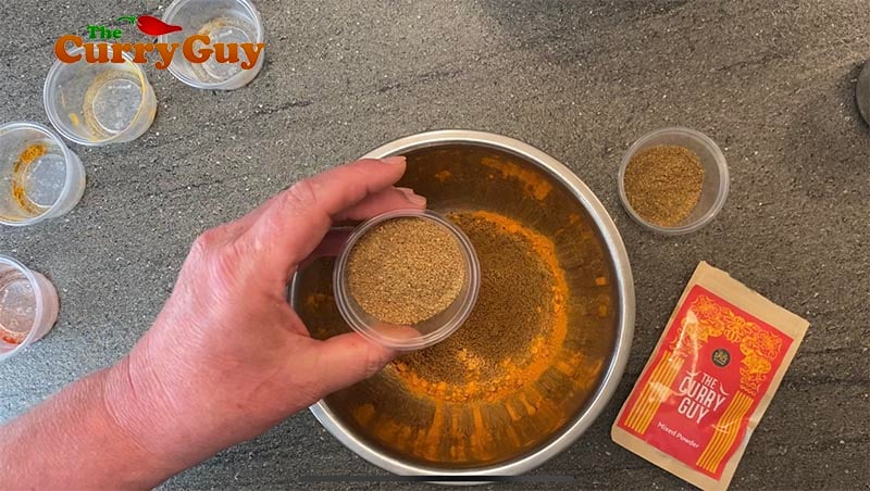 adding coriander powder