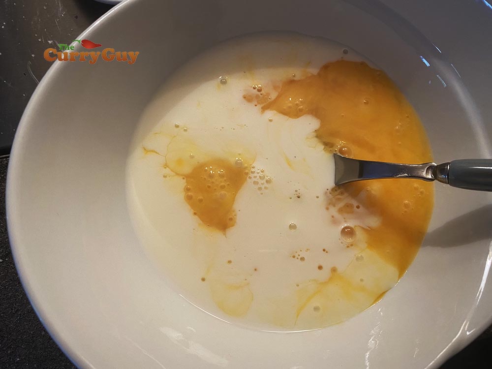 whisking milk and eggs