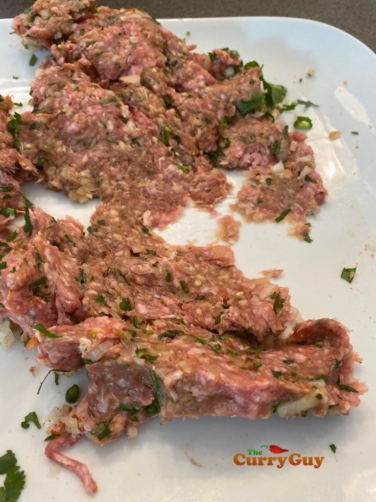 Kneading the minced lamb