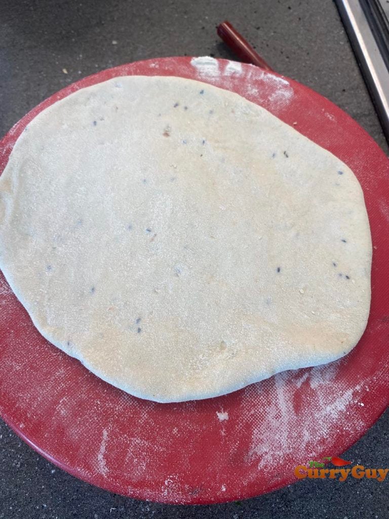 Keema naan rolled out flat
